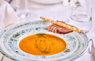 Pumpkin cream soup, with duck breast