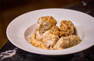 Golden walnut dumplings with vanilla custard